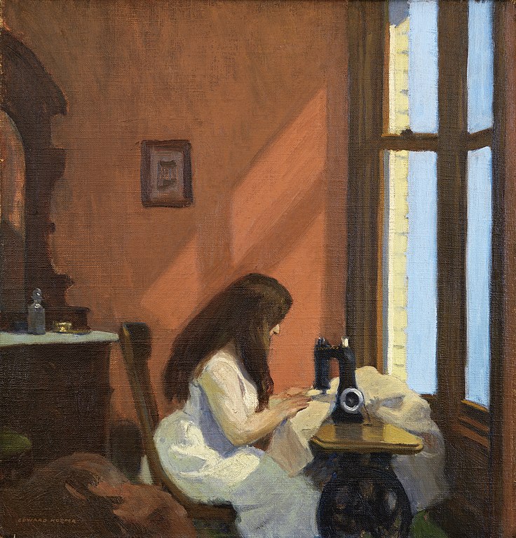 A sewing girl, windowlight down on her as she works.